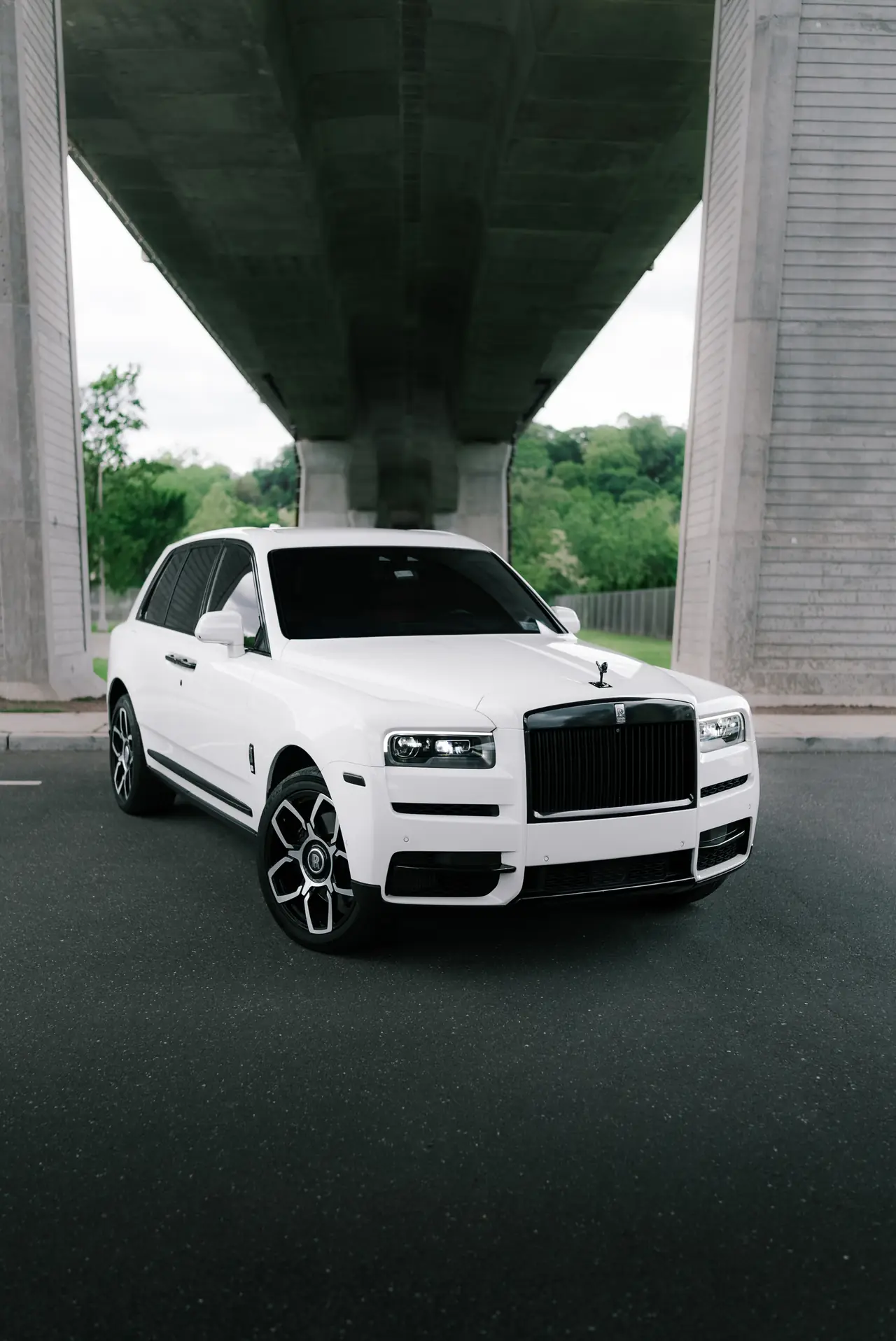 White Rolls-Royce Cullinan available for Noble wedding transportation