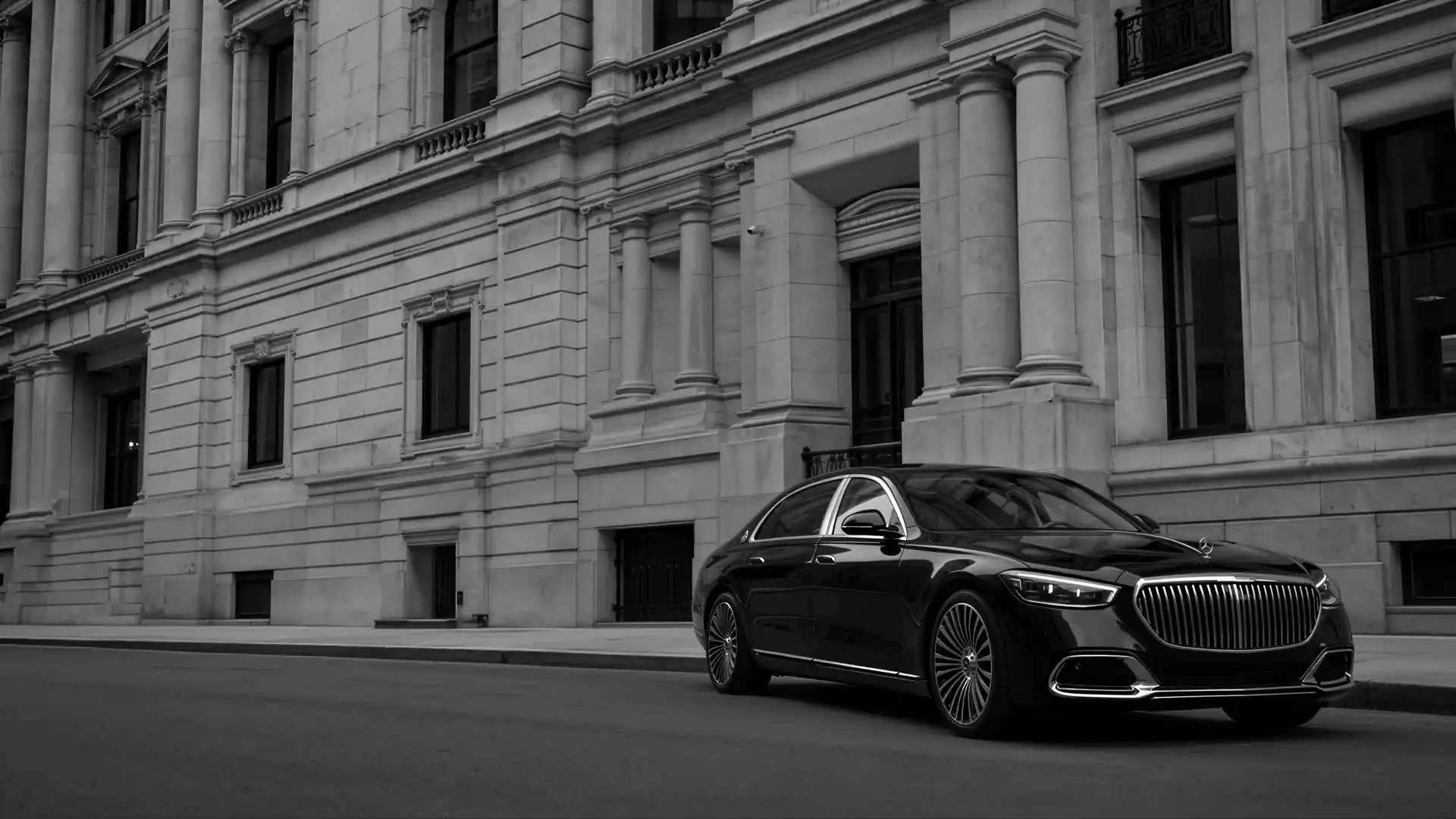 Black Mercedes outside a monumental New York stone building